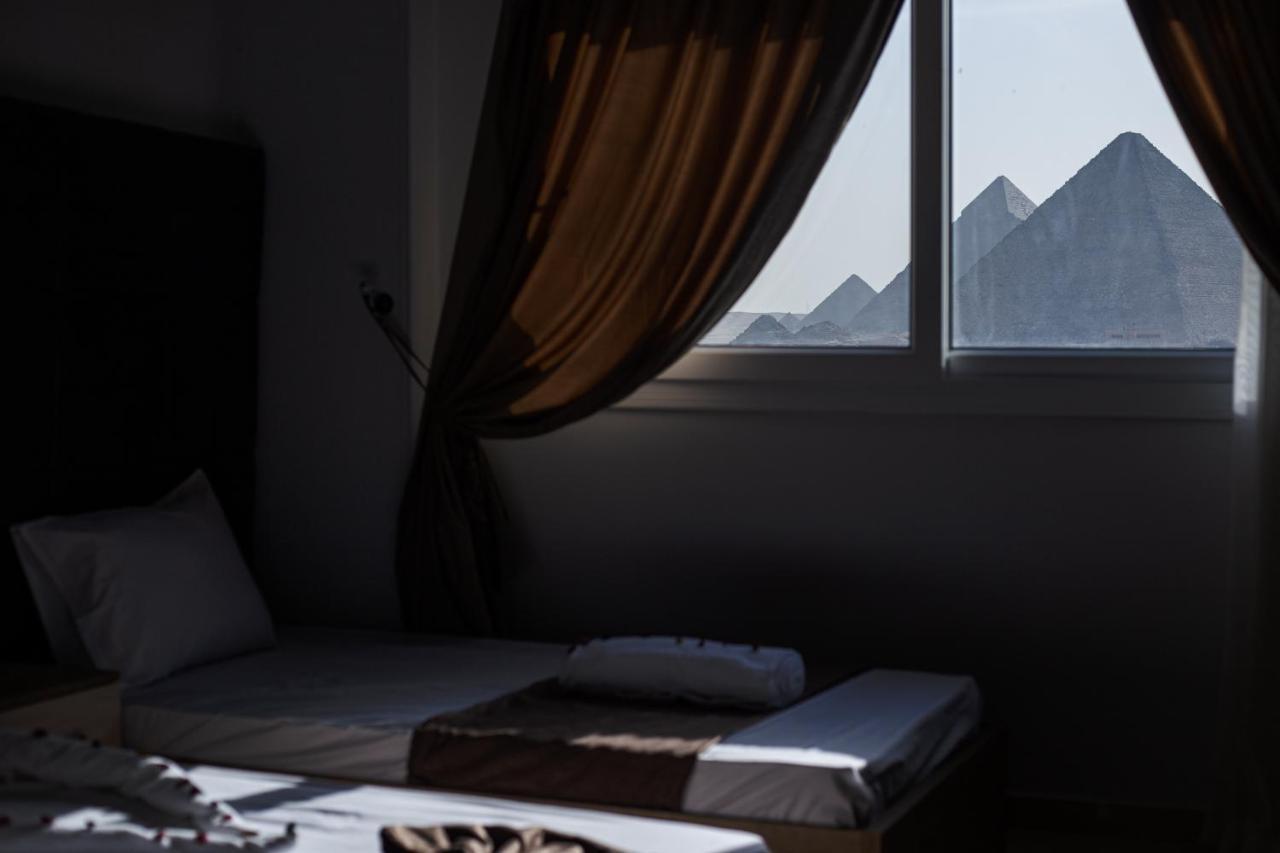 การ์ดีเนีย พีระมิดส์ วิว อินน์ Nazlet el-Sisi ภายนอก รูปภาพ